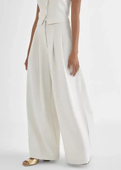 Online Pantalón ancho y fluído Pantalones