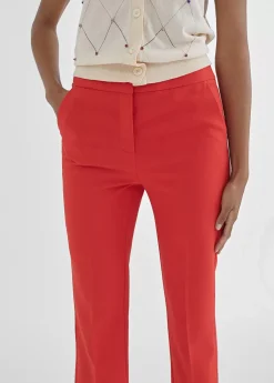 Pantalón skinny campana Pantalones