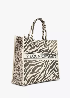 Discount Shopper tejido combinado zebra y leopard Bolsos