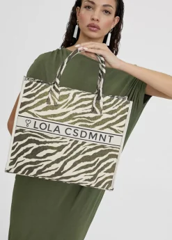 Discount Shopper tejido combinado zebra y leopard Bolsos